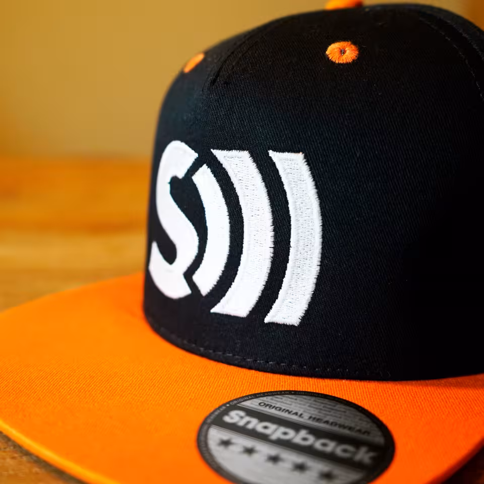 Casquette orange Les Sondiers